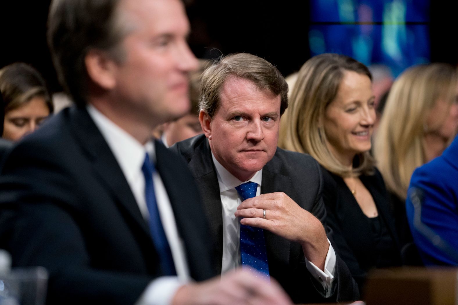 White House counsel Don McGahn looks at Kavanaugh during Tuesday's hearing.