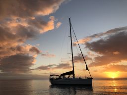 Take Off, the Wennberg's 41-foot Elan 410 yacht, at sunset in Dominica, in the West Indies.