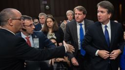 Fred Guttenberg, father of Parkland, Florida, shooting victim Jaime Guttenberg, tries to speak with Judge Brett Kavanaugh as he leaves for a break during his US Senate Judiciary Committee confirmation hearing to be an Associate Justice on the US Supreme Court, on Capitol Hill in Washington, DC, September 4, 2018.