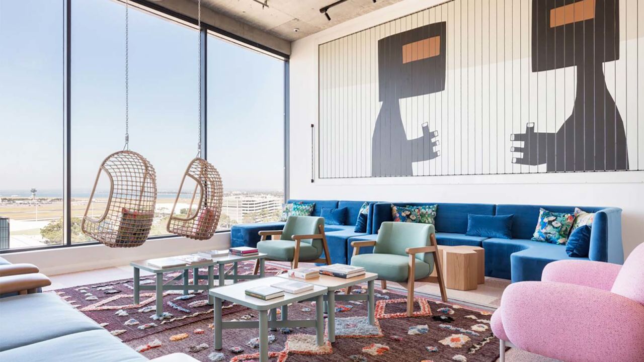 Take in the views from hanging chairs in the Penthouse lobby of Sydney's Felix Hotel.