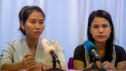 Pan Ei Mon (L) and Chit Su Win (R), wives of detained Reuters journalists Wa Lone and Kyaw Soe Oo, attend a press conference in Yangon on September 4, 2018. - A global outcry over the jailing of two Reuters journalists has been met with silence from Myanmar's civilian leader Aung San Suu Kyi, a stony response that an official defended on September 4 as a reluctance to criticise the judiciary. (Photo by YE AUNG THU / AFP)        (Photo credit should read YE AUNG THU/AFP/Getty Images)