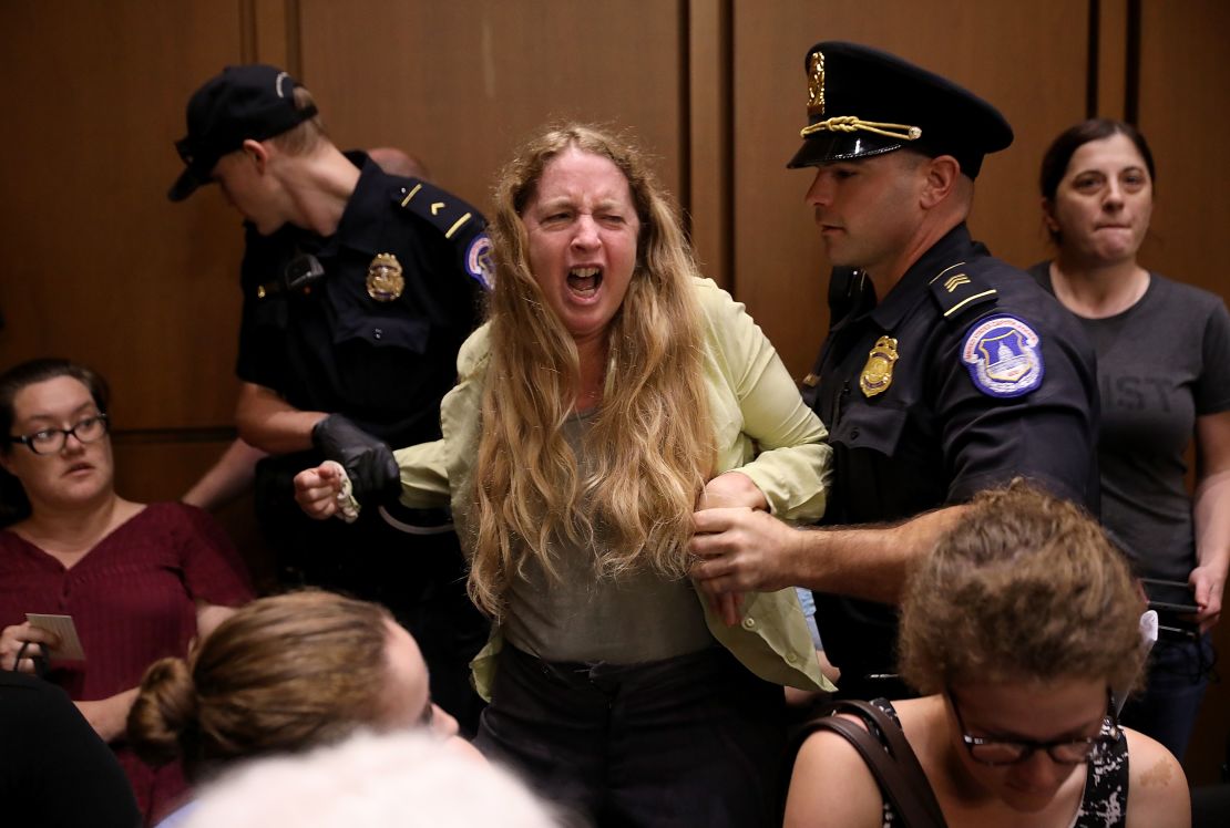 Protesters disrupt the confirmation hearing for Supreme Court nominee Judge Brett Kavanaugh before the Senate Judiciary Committee in the Hart Senate Office Building on Capitol Hill September 4, 2018.