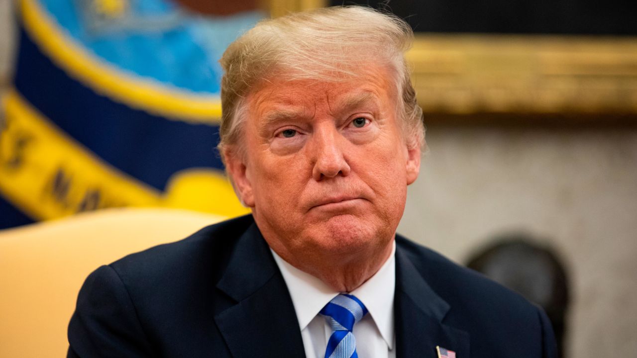 US President Donald Trump listens to a question as he meets with the Emir of Kuwait Jaber Al-Ahmad Al-Sabah in the Oval Office of the White House on September 5, 2018 in Washington, DC.