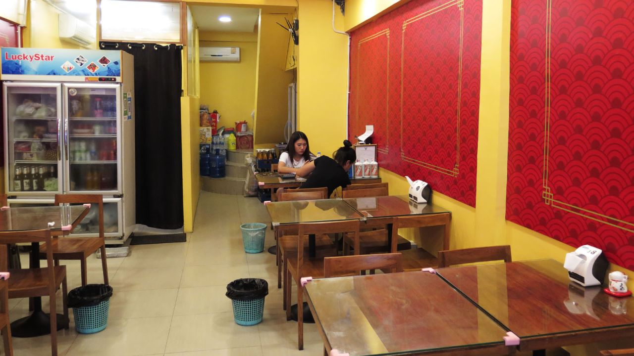 <strong>Yunnan cuisine: </strong>Tho Tao So restaurant opened in mid-2018 and offers Yunnan cuisine. Inside, the yellow walls are bare except for red decorative wallpaper.<br />