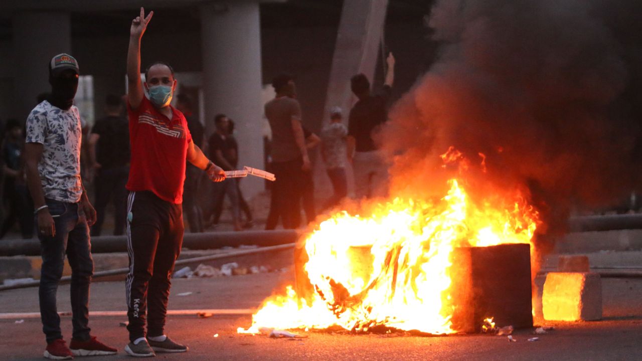 Iraqis protest against the government and the lack of basic services outside the regional government headquarters in the southern city of Basra on September 5, 2018. - Iraqi security forces opened fire on protesters today as the two sides clashed in the southern city of Basra, a day after six people were killed in demonstrations over poor public services. (Photo by Haidar MOHAMMED ALI / AFP)        (Photo credit should read HAIDAR MOHAMMED ALI/AFP/Getty Images)
