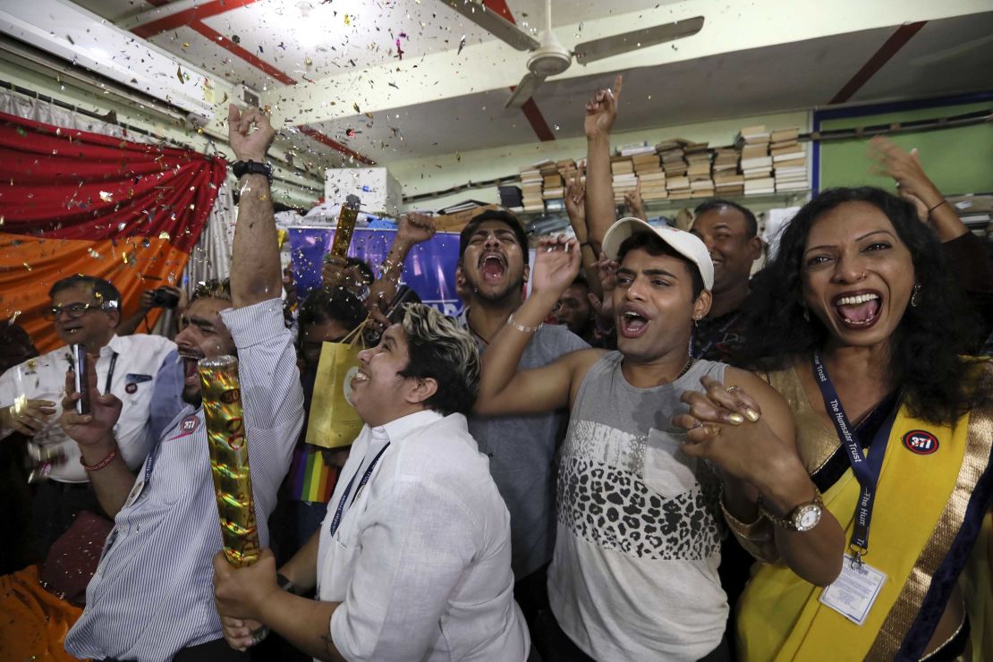Crowds in Mumbai cheer the Supreme Court announcement.  
