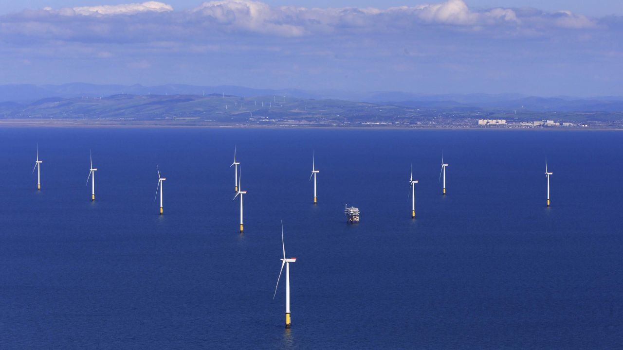 The Walney Extension. Embargoed to 0001 Thursday September 06 The Walney Extension in the Irish Sea off the coast of Cumbria, the world's largest working offshore wind farm which has opened on Wednesday. Picture date: Wednesday September 5, 2018. The Walney Extension, a Danish-led and funded project in the Irish Sea off Cumbria, has 87 turbines Ð each around twice the height of Big Ben, standing approximately 190 metres high. See PA story ENVIRONMENT Walney. Photo credit should read: Peter Byrne/PA Wire URN:38366554 (Press Association via AP Images)