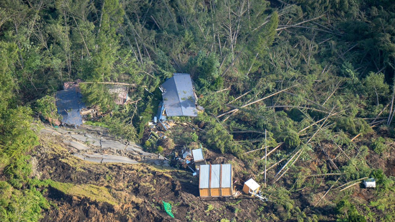 This picture shows an aerial view of houses damaged by a landslide in Atsuma, Hokkaido, on September 6, 2018, after an earthquake hit the northern Japanese island of Hokkaido.