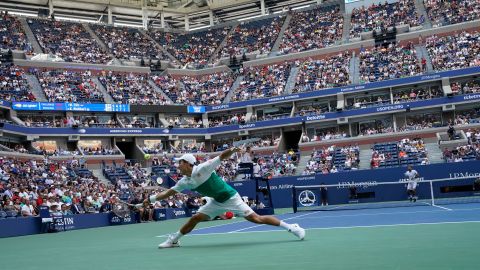 Nishikori stretches for a return during his quarterfinal match against Marin Cilic.
