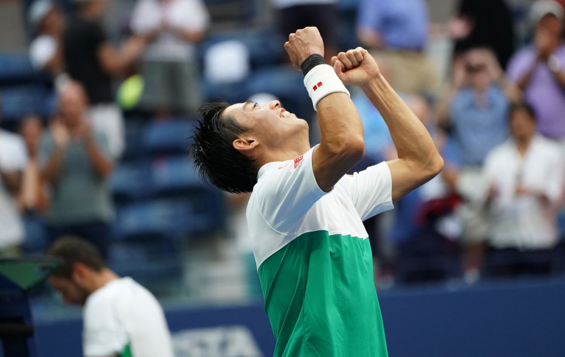 Kei Nishikori reacts to defeating Marin Cilic in five sets at the US Open quarterfinals