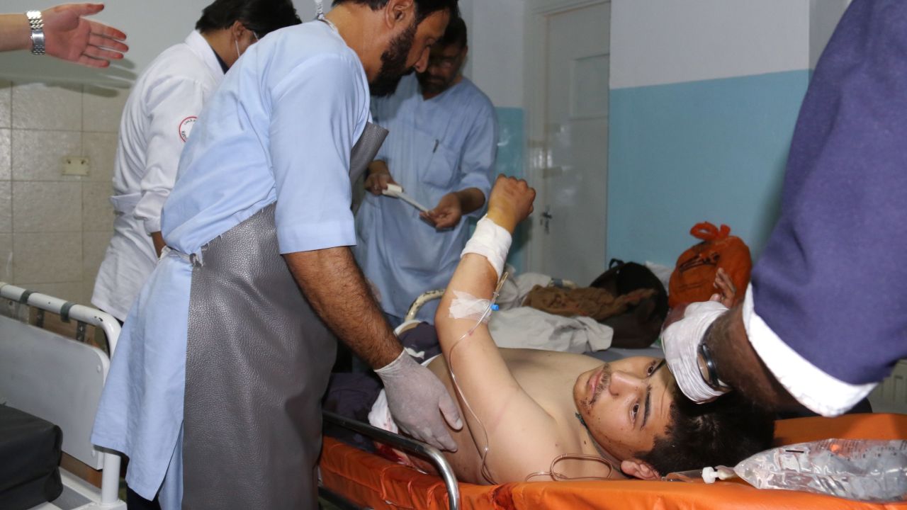 An Afghan victim receives medical treatment at a hospital following twin blasts in Kabul on September 5, 2018.