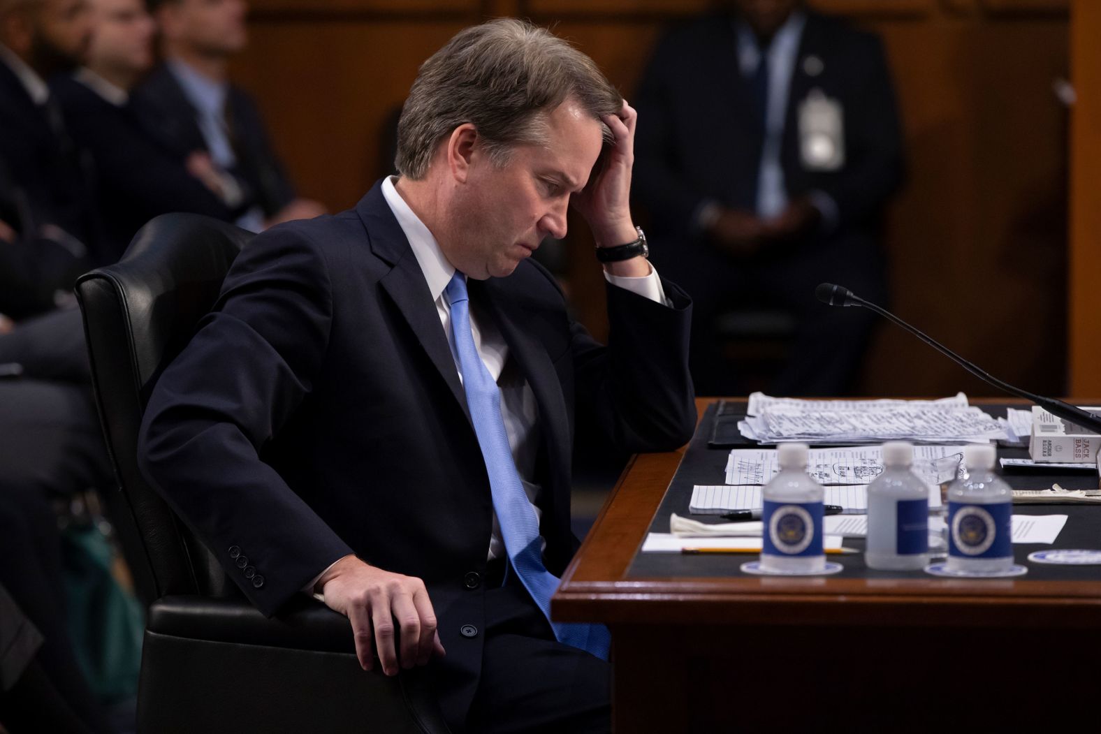 During more than an hour of delay over procedural questions, Kavanaugh waits to testify before the Senate Judiciary Committee on Thursday.