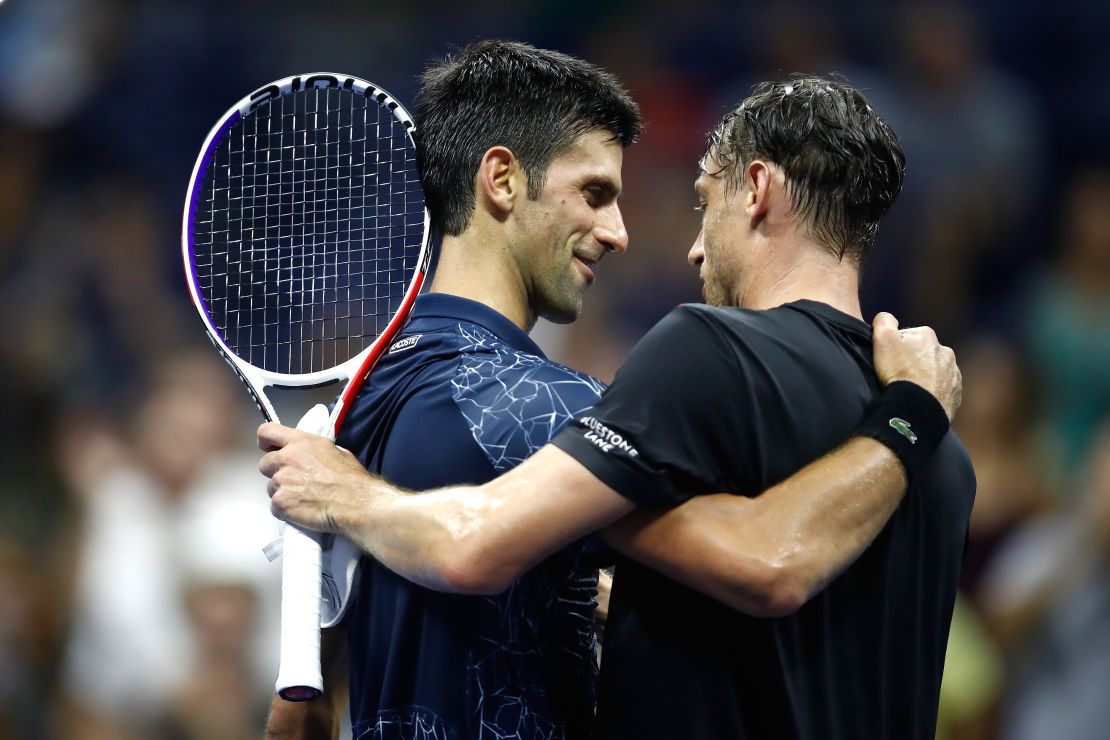 Djokovic consoles Millman after beating him to advance to the semifinals of the 2018 US Open.
