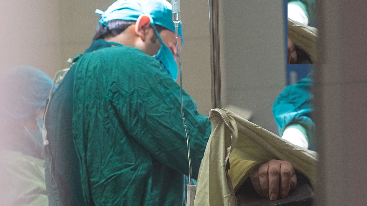 Doctors begin another round of surgery on a teen who had his arm torn off by a bomb. Surgeons say his is an average case.