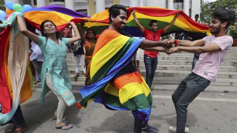 Members of India's LGBT community dance in celebration after the ruling was announced in Bangalore on Thursday.