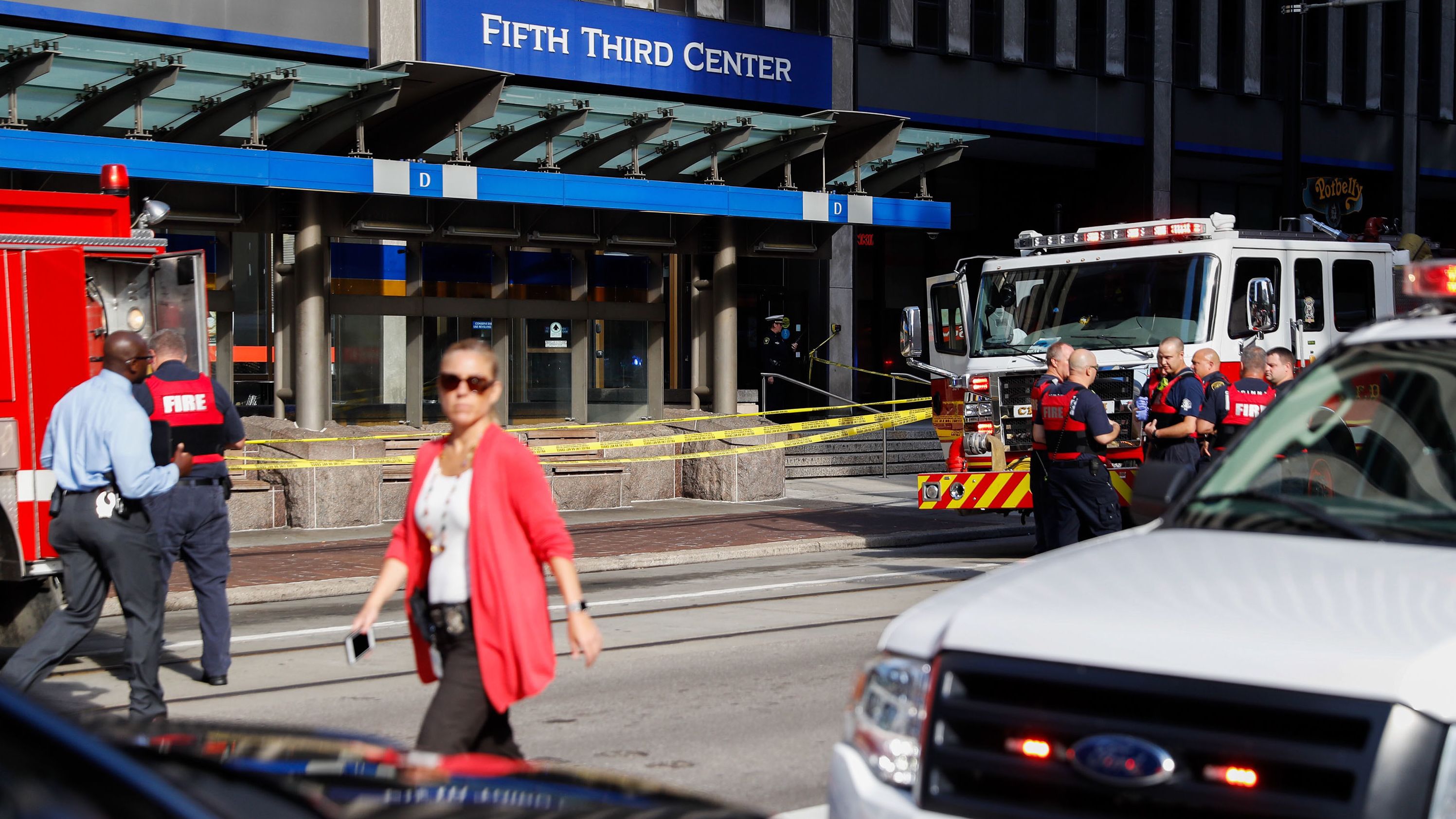 Emergency personnel and police respond to a reported active shooter situation near Fountain Square on Thursday.