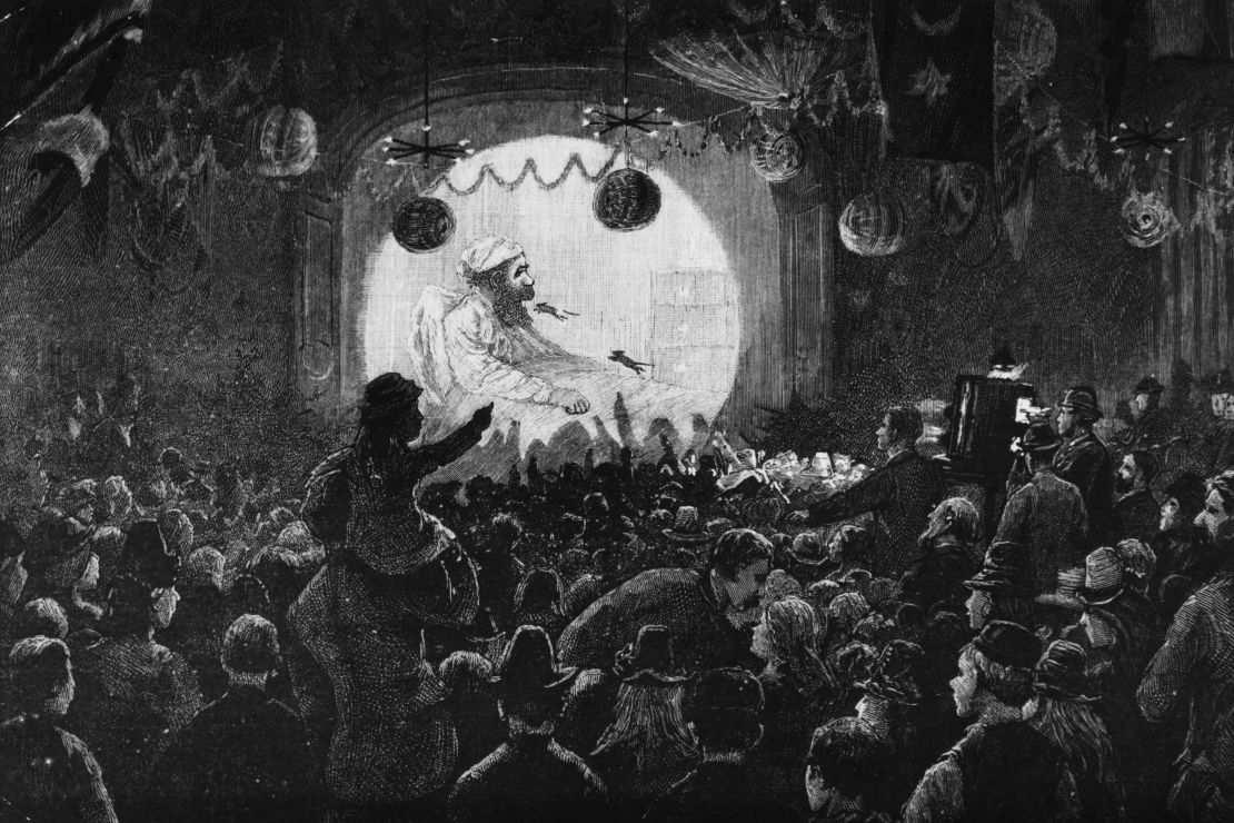 An engraving of a magic lantern show given for 1,450 poor children in Fulham, London in 1889.