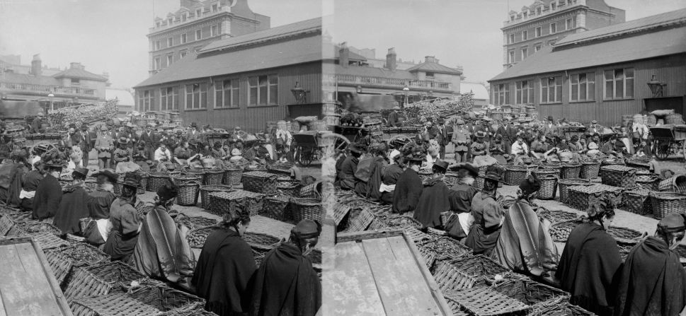 Women shelling walnuts at Covent Garden market, circa 1890.