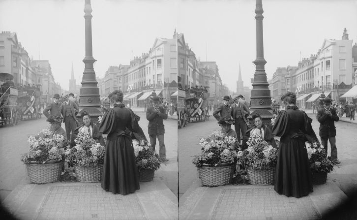 Flower sellers with their baskets of wares in Regent Street, circa 1900. 