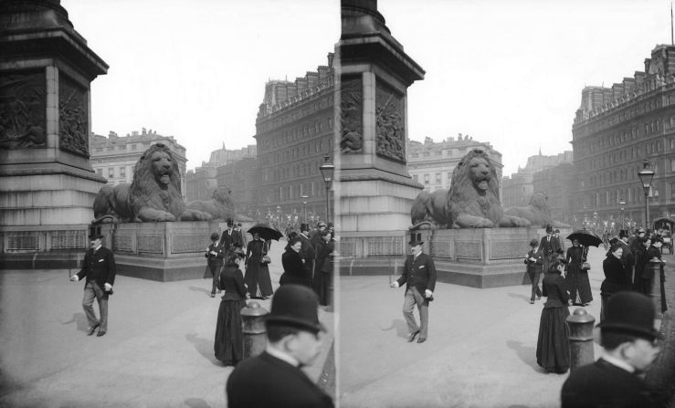 People passing the base of Nelson's column in Trafalgar Square, circa 1890. 