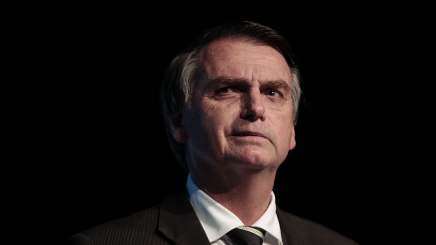 The Brazilian presidential candidate for the Social Liberal Party, Jair Bolsonaro, gestures during the Brazilian Sugarcane Industry Association's Unica Forum 2018 in Sao Paulo, Brazil, on June 18, 2018. - Brazil holds general elections in October. (Photo by Miguel SCHINCARIOL / AFP)        (Photo credit should read MIGUEL SCHINCARIOL/AFP/Getty Images)