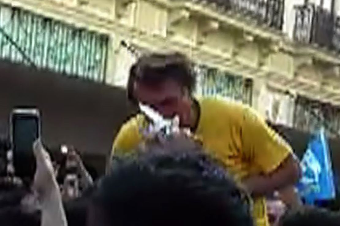 A screen grab shows the moment just before Bolsonaro was stabbed Thursday.