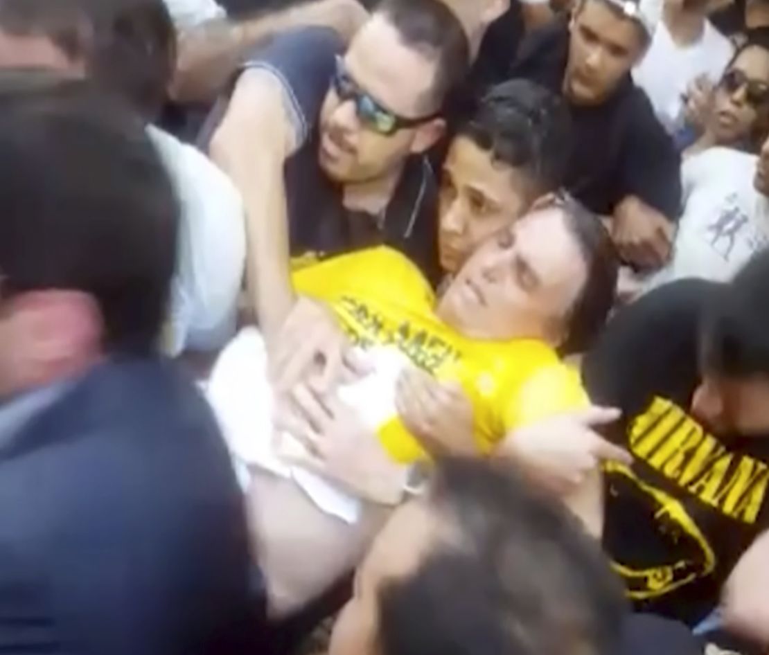 Jair Bolsonaro is carried away after being stabbed during a campaign rally in Juiz de Fora, Brazil.
