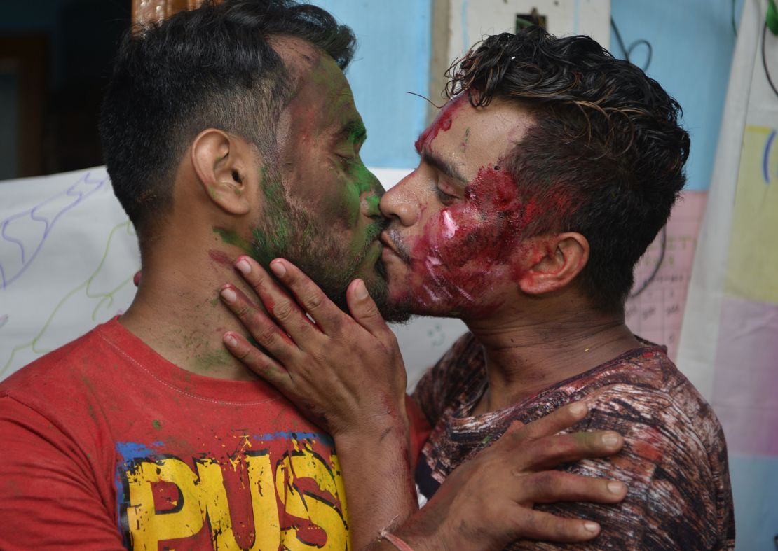 Two men kiss as members of the LGBT community celebrated the Supreme Court's ruling. "The law had become a weapon for harassment for the LGBT community," Chief Justice Dipak Misra said as he announced the landmark verdict. 