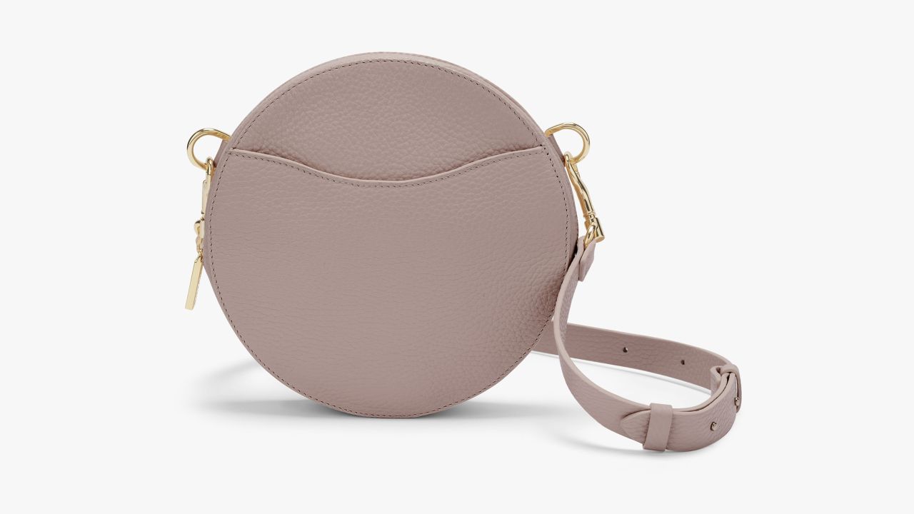 <strong>Cuyana:</strong> The<a href="https://www.cuyana.com/mini-circle-belt-bag.html#soft-rose" target="_blank" target="_blank"> mini circle belt bag</a> ($140) is made from Italian leather and can be worn as a belt or used as a shoulder bag.