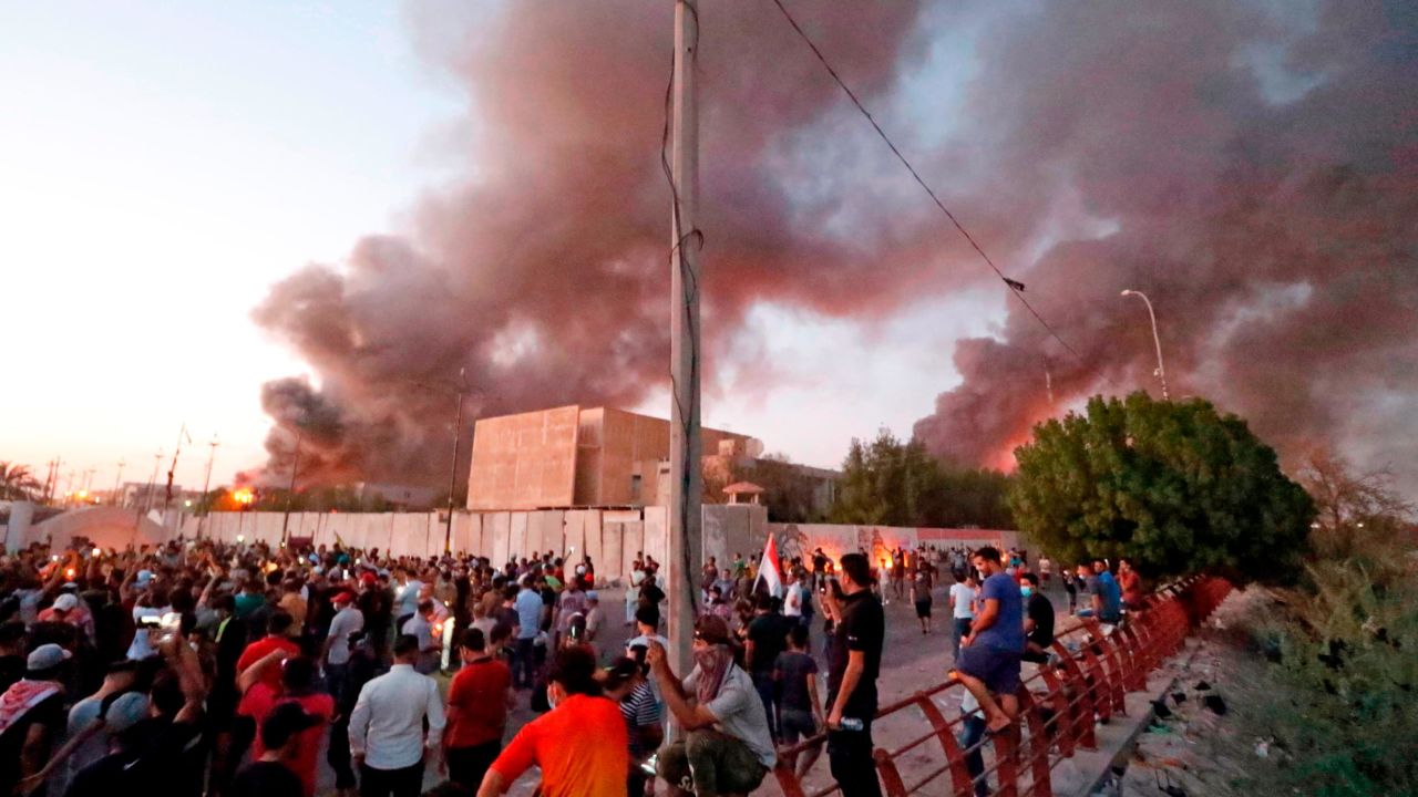 Iraqi protesters break into an official building amid demonstrations this week.