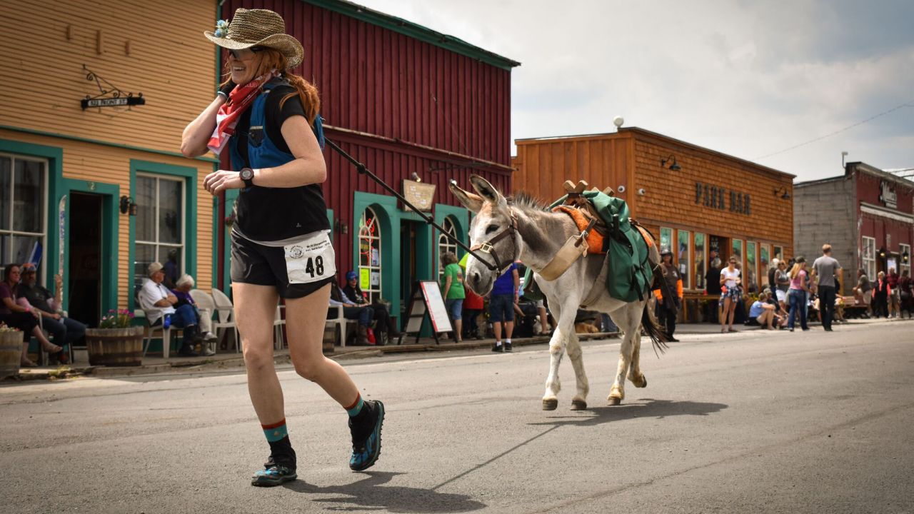 Valerie Nussbaumer and Burrowed Thumper in downtown Fairplay, where the race starts and ends.