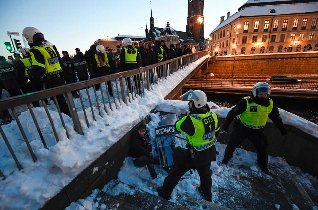 Police separate demonstrators in Stockholm in November 2016 after a protest against migrants.