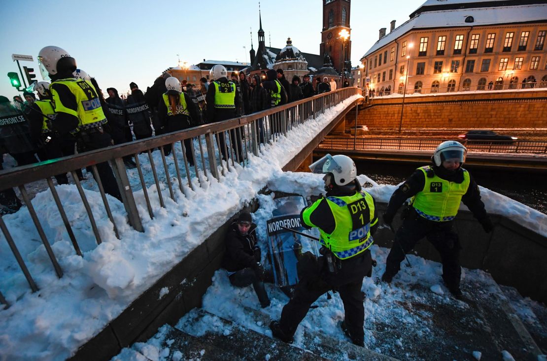 Police separate demonstrators in  Stockholm in November 2016 after a protest against migrants. 