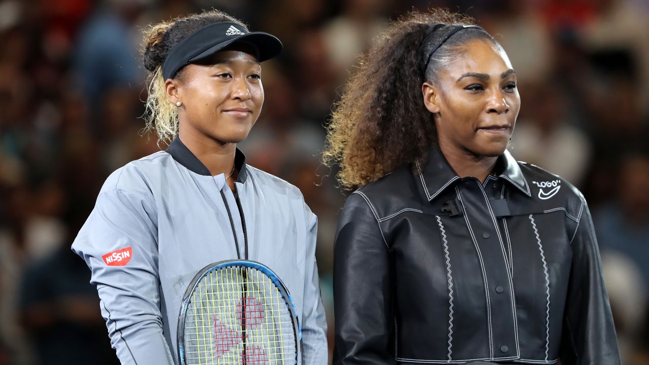 Serena Williams (right) and Naomi Osaka line up before the women's final. It couldn't foreshadow the drama that was to come. 