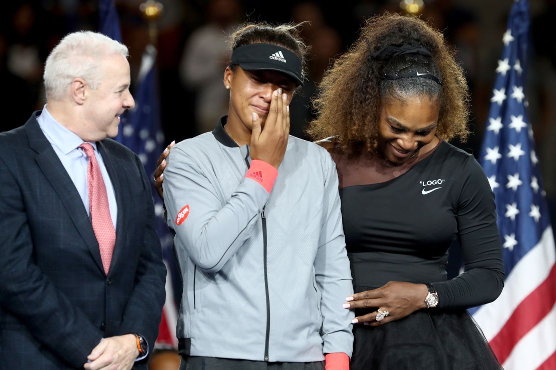Naomi Osaka (center) was in tears during the presentation ceremony.