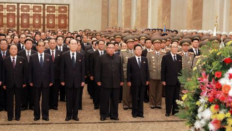 In this photo provided Sunday by the North Korean government, North Korean leader Kim Jong Un, center, visits the Kumsusan Palace of the Sun in Pyongyang, North Korea. Independent journalists were not given access to cover the event depicted in this image distributed by the North Korean government. 