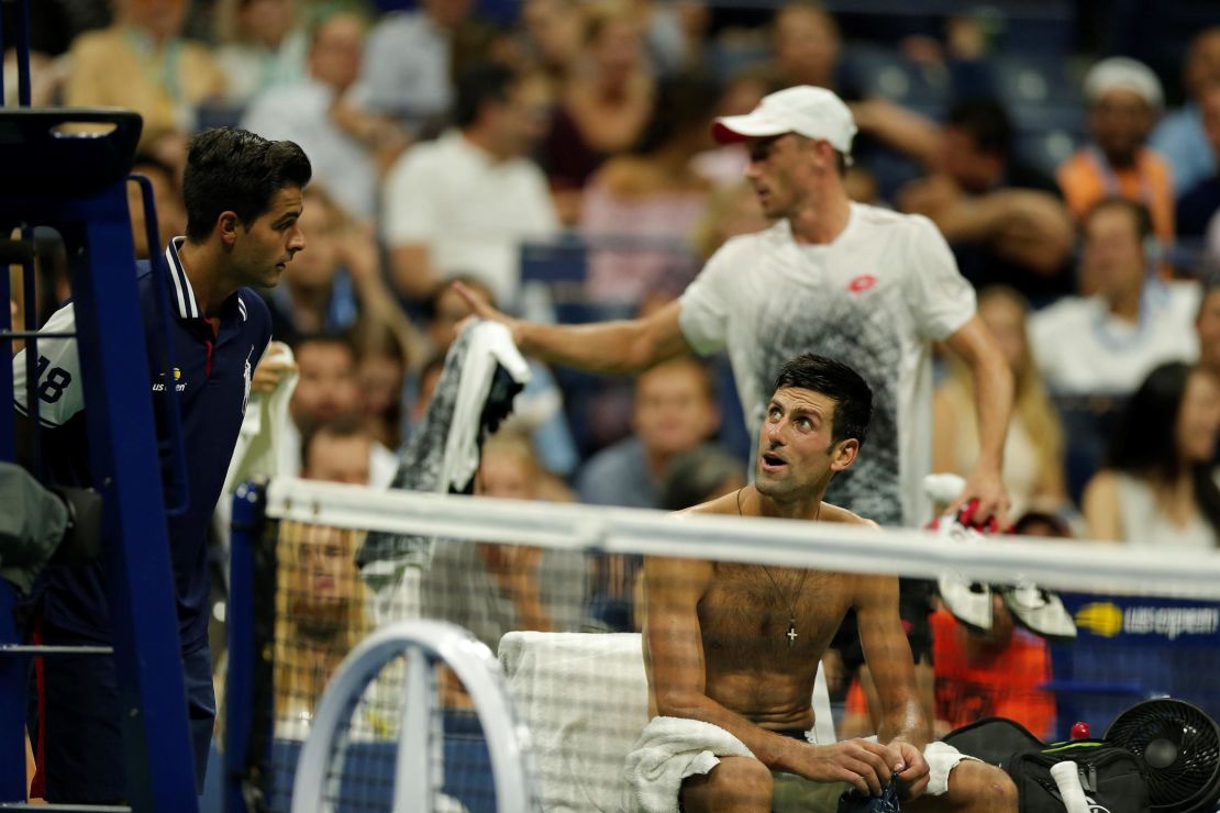 Novak Djokovic stayed in court while John Millman of Australia left the pitch to change his shirt due to the humidity during a US Open Men's singles quarter-finals match on Wednesday.