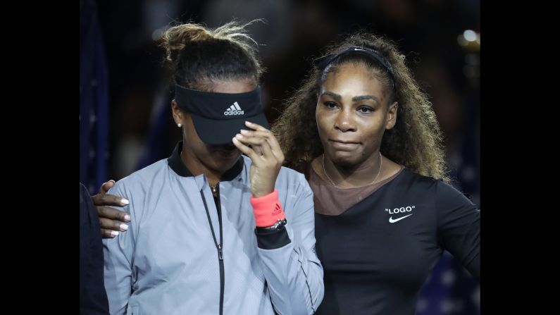 Naomi Osaka, left, of Japan, is hugged by Serena Williams after Osaka defeated Williams in the women's final of the US Open tennis tournament on Saturday, September 8, in New York. 