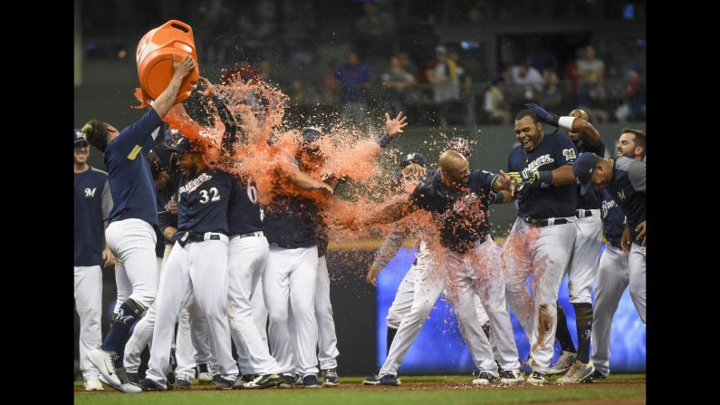 The Milwaukee Brewers players celebrate after defeating the Chicago Cubs at Miller Park on Monday, September 3.