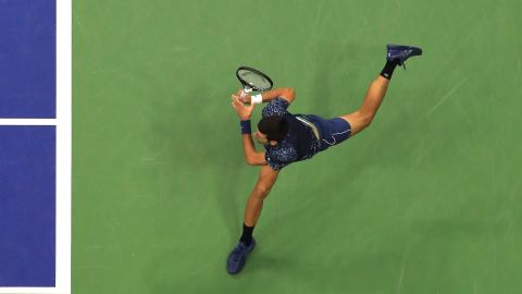 Novak Djokovic stretches during the US Open final Sunday.
