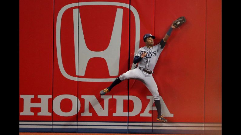 Mallex Smith of the Tampa Bay Rays makes a catch against the wall in the fifth inning during action against the Toronto Blue Jays on Wednesday, September 5, in Toronto.