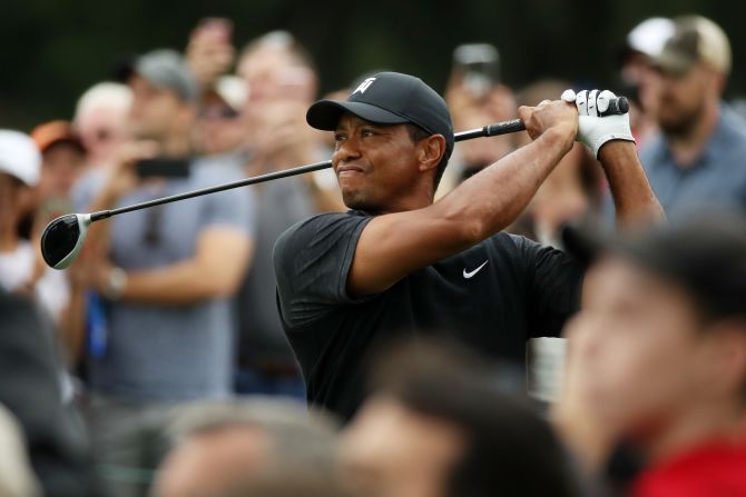 Tiger Woods plays his shot from the seventh tee during the third round of the BMW Championship at Aronimink Golf Club on Saturday, September 8, in Newtown Square, Pennsylvania.