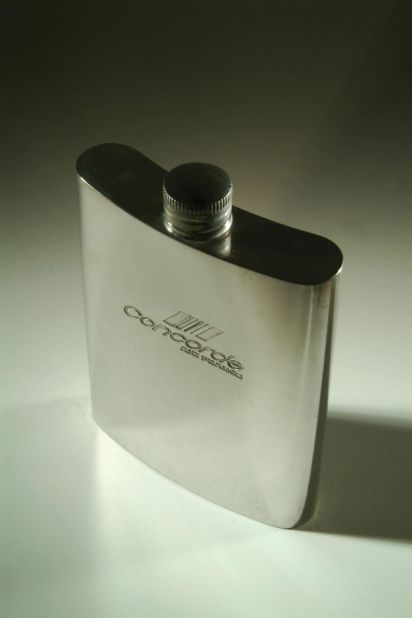 An Air France silver-plated Concorde cognac flask from the 1970s.