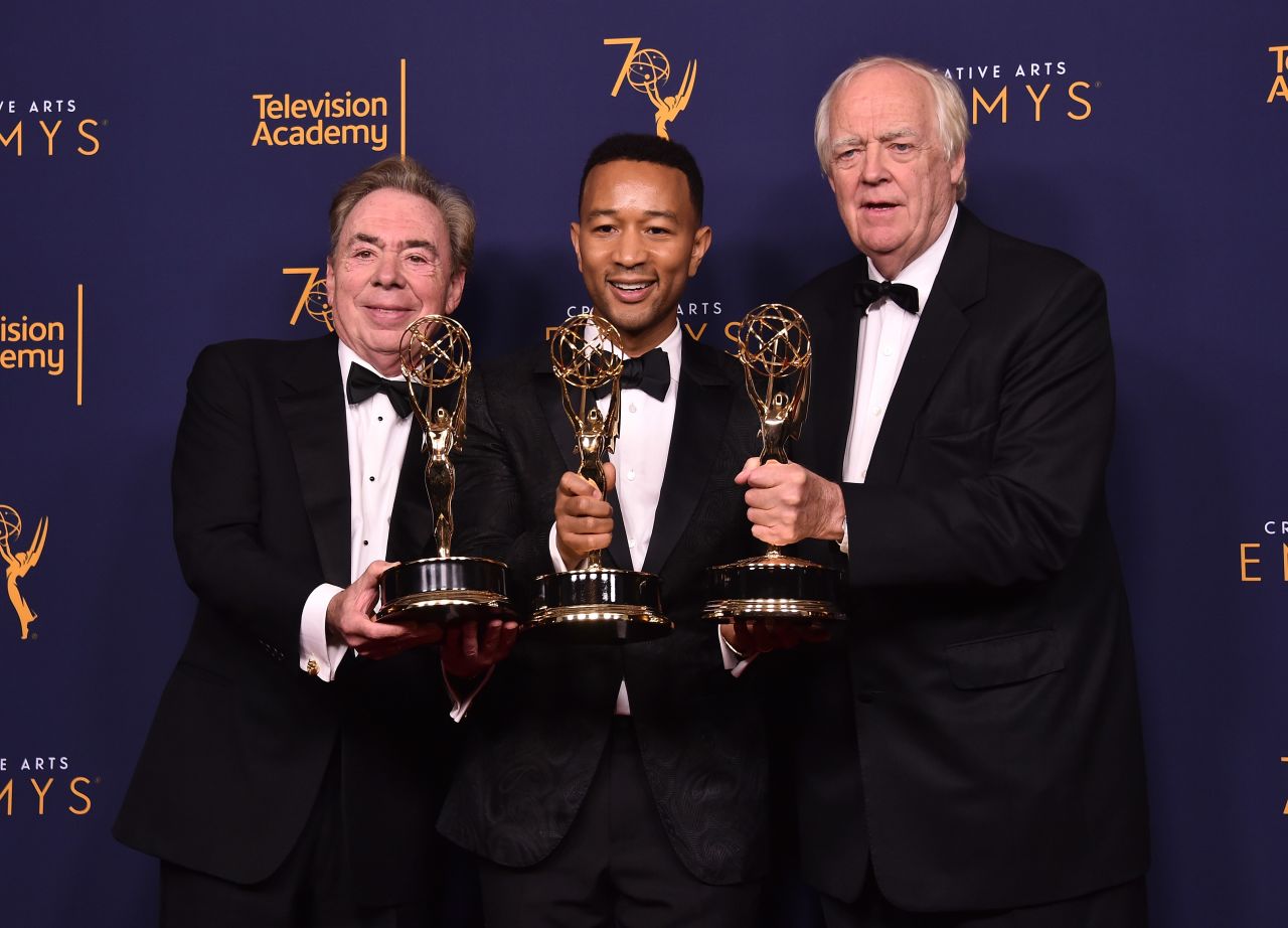 Sir Andrew Lloyd Webber, John Legend and Tim Price became the latest EGOT winners thanks to "Jesus Christ Superstar Live in Concert's" Emmy win for outstanding variety special. Here the trio pose in the press room after their win at the Microsoft Theater on September 9, 2018 in Los Angeles, California.  