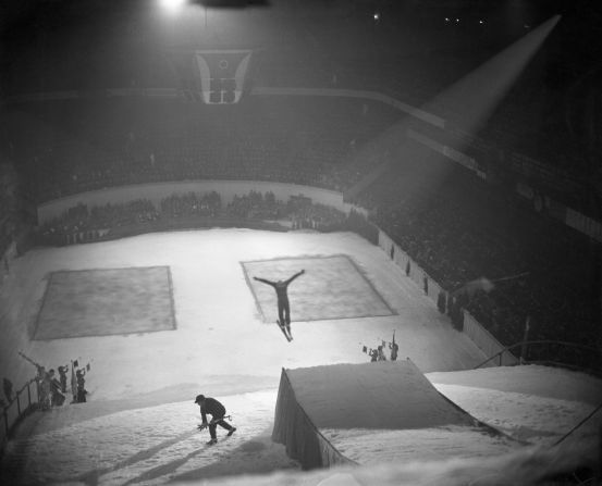 For those in search of spectacle and derring-do, the North American Winter Sports Exposition and International Ski Meet at Madison Square Garden, in New York, was the place to be in the 1930s. Pictured is Casey Jones mid-flight in the professional ski jumpers competition at the second annual expo.