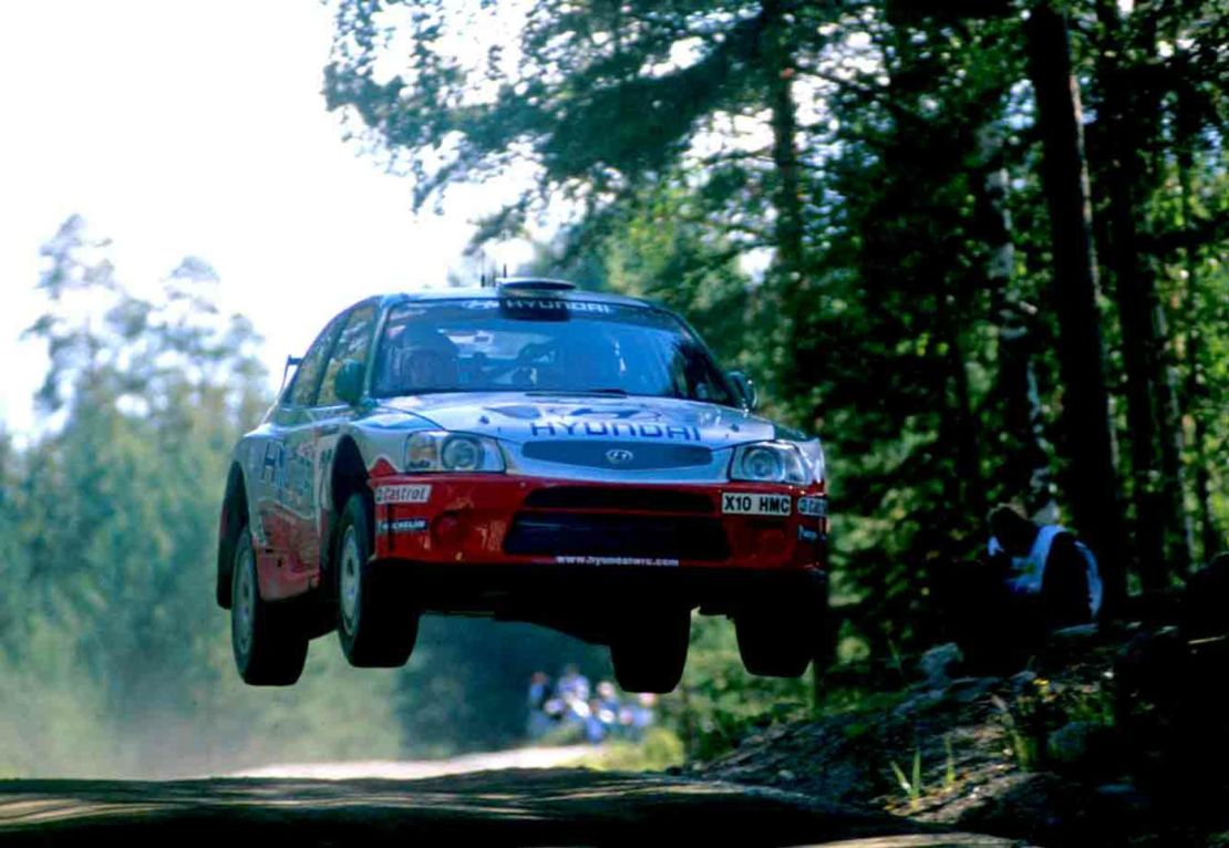 Former rally world champion, Juha Kankkunen of Finland, jumps during the Neste rally in 2001.