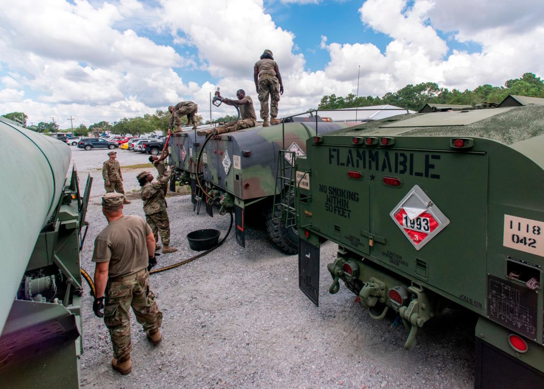 South Carolina National Guard soldiers from the 118th Forward Support Company transfer fuel to tankers. The Guard has been called out to assist civilians affected by Hurricane Florence.