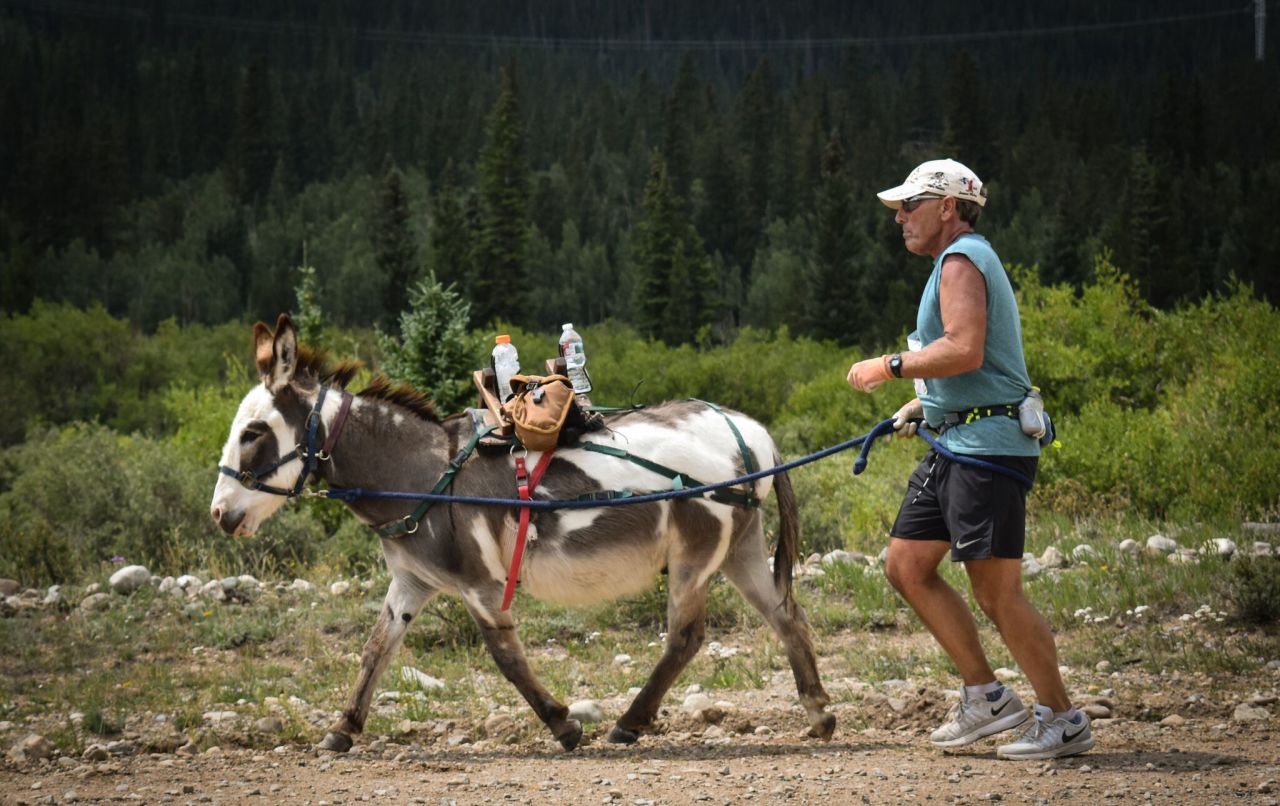 Lon Vincent and Dakota. Runners  benefit with getting as many miles together as possible on training runs. Humans need to acclimate to higher elevations, but donkeys don't. 