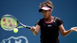 STANFORD, CA - JULY 28:  Naomi Osaka of Japan returns a shot to Samantha Stosur of Australia during Day 1 of the Bank of the West Classic at the Taube Family Tennis Stadium on July 28, 2014 in Stanford, California.  (Photo by Ezra Shaw/Getty Images)