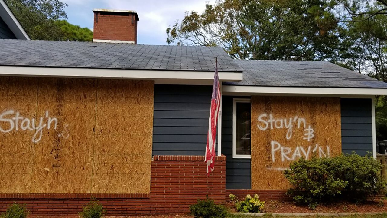 The residents of this home in Southport, North Carolina, indicate they are going to ride out the storm.